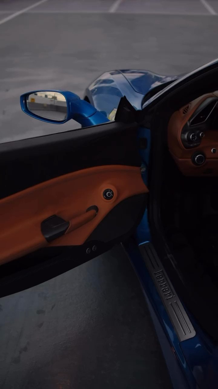 Sports car interior detail, stitched leather