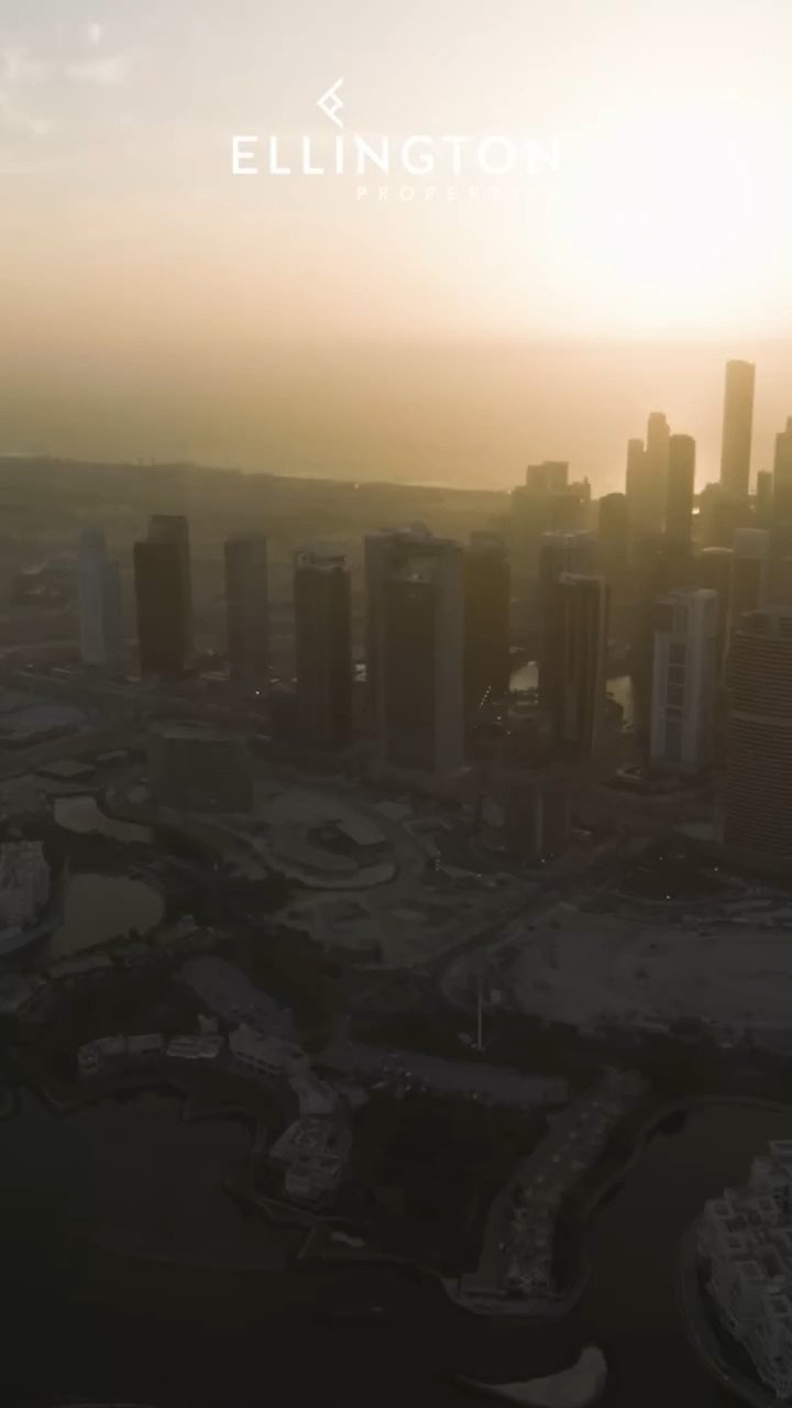 Dubai skyline at dawn, aerial property sequence